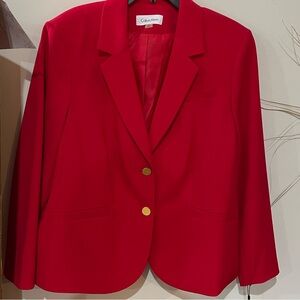 Calvin Klein red pant suit.  Two gold buttons on jacket